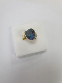 Ring 585 Gelbgold Boulder Opal 1 Brill -,05 ct &euro; 1.550,00